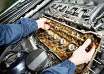 Machanic repairman at automobile car engine repair